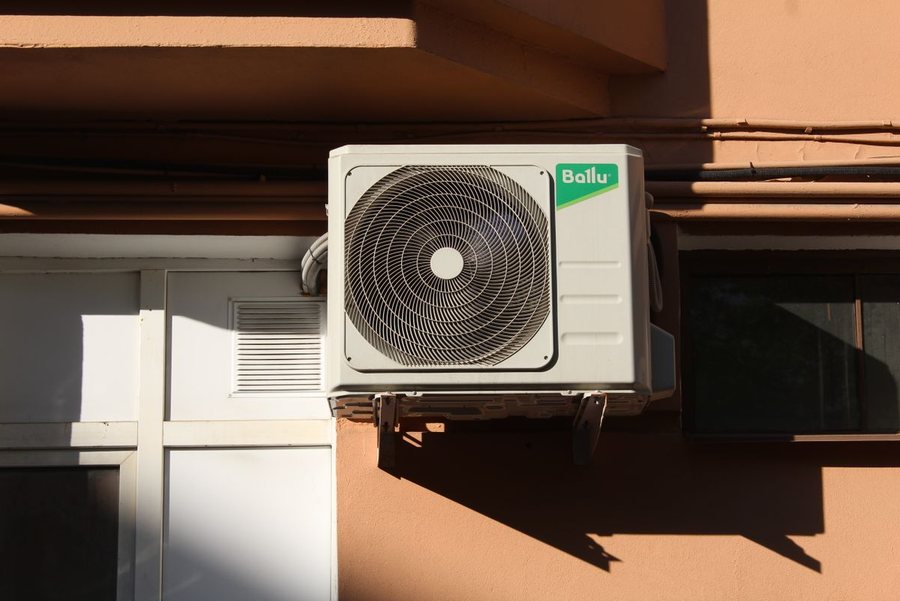 Outdoor air-conditioning condenser unit installed at a home